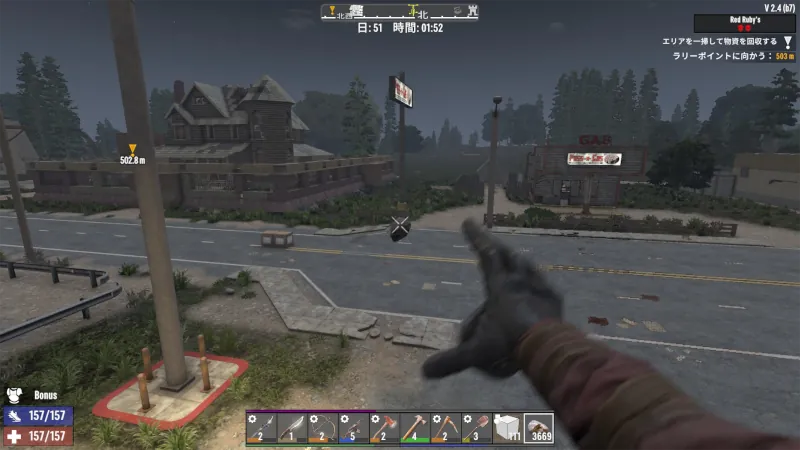 誘導用の石ころを投げている画像。